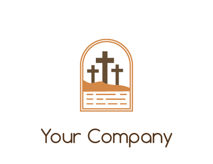 cross in sand in window frame